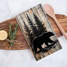 1 set/2 pièces/100 pièces Serviettes de cuisine et torchons avec motif de silhouette d'ours noir et de pins sur fond en bois, convient pour la décoration intérieure des restaurants, cuisines et salles de bains, la décoration de fête, les cadeaux de festival, en tant que cadeau