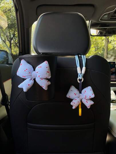 创意蝴蝶结汽车垃圾桶带樱桃图案汽车座椅靠背储物桶，汽车内饰装饰配件清洁储物桶