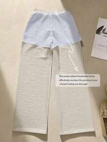 女士简约舒适休闲透气弹力腰亚麻长裤，适合春夏秋季节穿着。裤子饰有手工缝制纽扣。