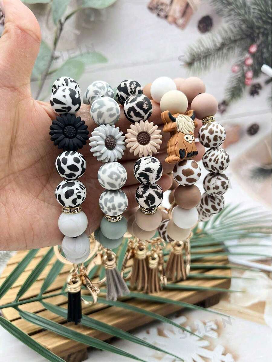 1pc Fashion Keychain Pendant, Bohemian Style Bellis Perennis Yak Pendant, Silicone Cow Pattern Silicone Beaded Tassel Charm Wrist Keychain, Backpack Accessories, Key Anti-Lost Bracelet, Gifts For Friends, Gifts For Mother, Gifts For Girls, Christmas Gifts Halloween Accessories Teachers Day Gift Ideas Bag Accessories Lanyards With Id Holder Car Accessories Bag Charms
