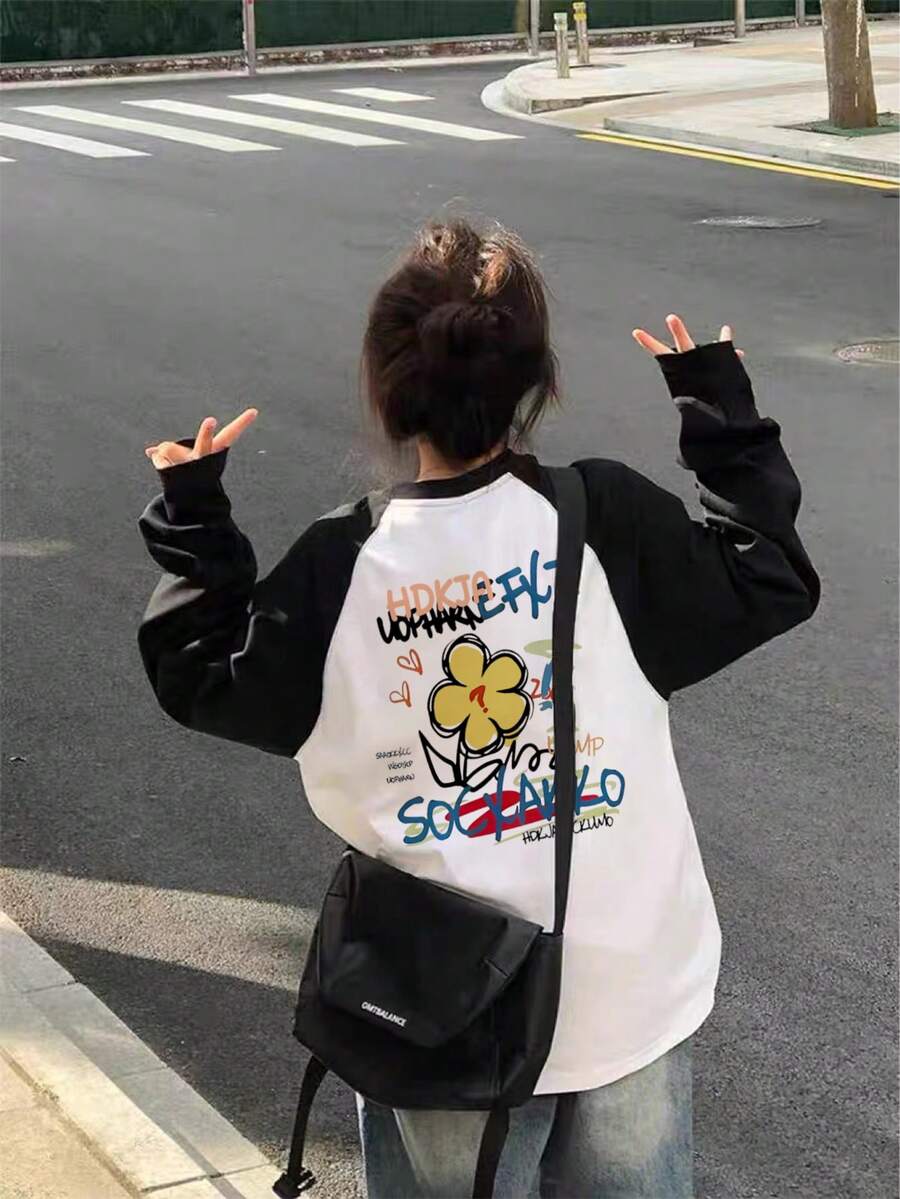 女士宽松休闲百搭印花插肩袖撞色卡通印花长袖T恤 - 黑與白 - 查看 1