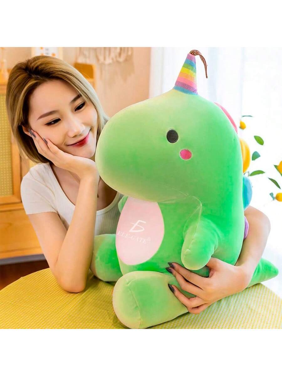 Juguete de peluche de dinosaurio