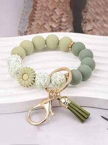 1pc Fashion Keychain Pendant, Bohemian Style Bellis Perennis Yak Pendant, Silicone Cow Pattern Silicone Beaded Tassel Charm Wrist Keychain, Backpack Accessories, Key Anti-Lost Bracelet, Gifts For Friends, Gifts For Mother, Gifts For Girls, Christmas Gifts Halloween Accessories Teachers Day Gift Ideas Bag Accessories Lanyards With Id Holder Car Accessories Bag Charms