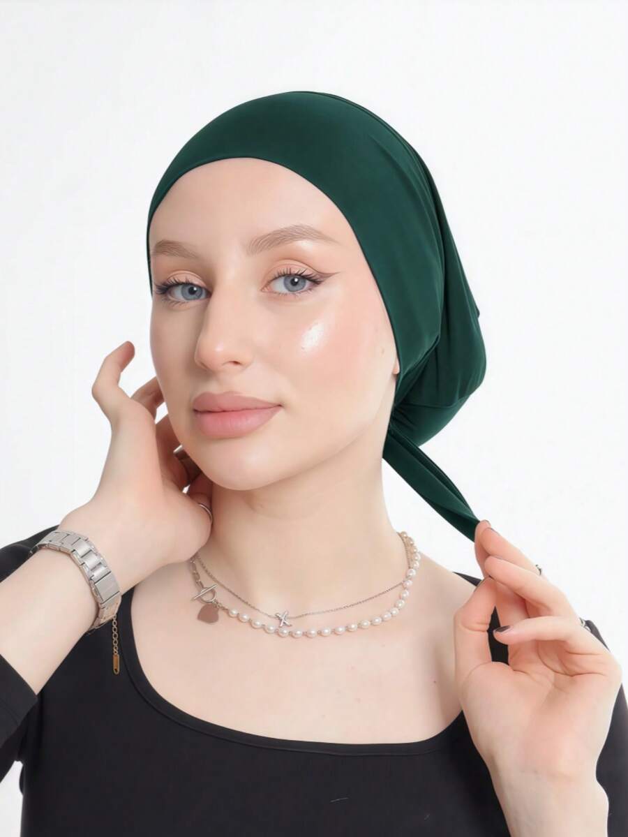 1件纯色简约时尚柔软系带头巾帽，可作头巾、发带、化疗帽，适合日常生活和户外运动，也可作为长袍配饰。