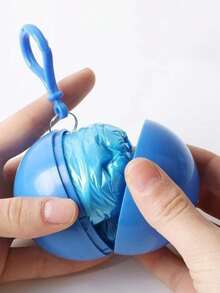 معطف مطر ملون صغير محمول قابل للتخلص منه ومقاوم للماء للبالغين مع سلسلة مفاتيح