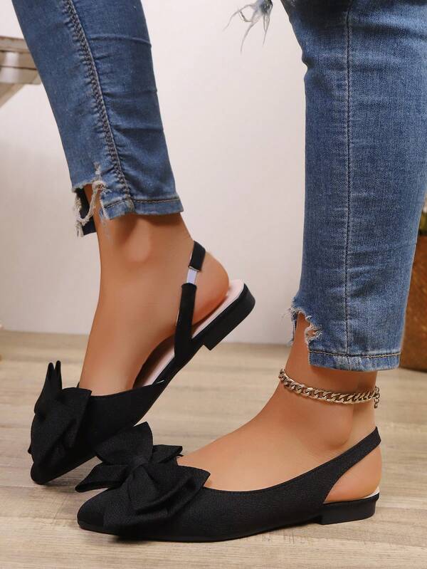 2025 Nuevos zapatos planos con punta puntiaguda, cómodos y de moda para mujeres, con decoración de lazo negro, adecuados para Navidad, Halloween, fiestas, uso casual, citas