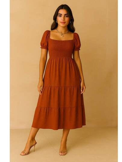 Vestido estilo bohemio liso, largo al tobillo, manga puff, escote cuadrado y parte superior fruncida con elástico que se adapta a diversas siluetas.