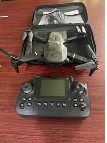 CASRRA This Upgraded E88 Drone Is Equipped With A Camera And Has A Screen Remote Control Function, Allowing You To View The Latest E88 Drone's Flight Footage In Real-Time. It Features A 720P Dual Camera, Brushless Motors, Altitude Control, Gesture Control, Gravity Sensing, Foldable Body, And Auto-Capture Capabilities, Making It Suitable For Indoor And Outdoor Use. It Is Affordably Priced, Making It An Ideal Toy For Adult Drone Enthusiasts And A Great Birthday Or Holiday Gift. - Black - View 11