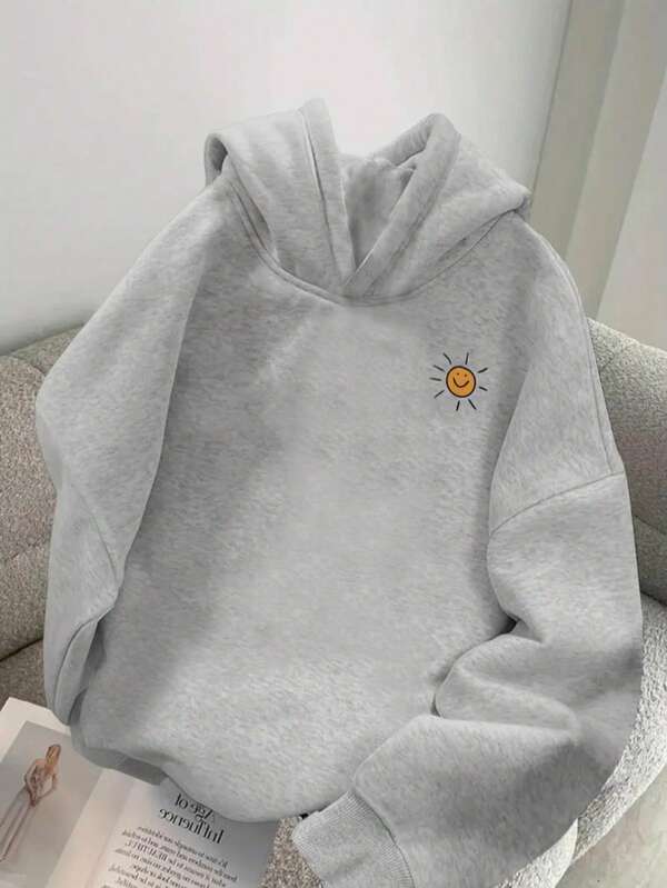 Sudadera con capucha térmica casual de hombros caídos y estampado de sol para adolescentes en otoño e invierno