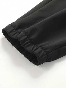 Escolha esta calça de moletom! O design com barra dobrada é prático e permite transitar facilmente entre a academia e o dia a dia. Leggings - Preto - Ver 9