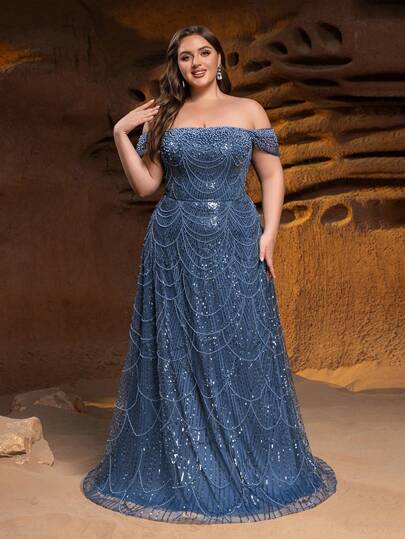 Faeriesty 这款华丽的珠饰亮片晚礼服，采用露肩及地设计，裙摆飘逸，宛如梦幻水下世界，闪耀夺目，是海滨时装秀、奢华派对、水上主题派对、婚礼等场合的理想之选。
