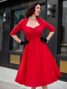 Vestido midi de baile estilo años 60 con cuello de corazón y vuelo en color rojo rosa vintage