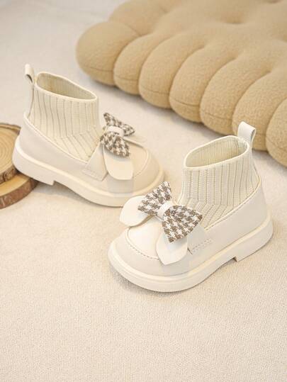 1 双女婴蝴蝶结针织柔软防滑弹力靴，适合秋冬季日常户外穿着