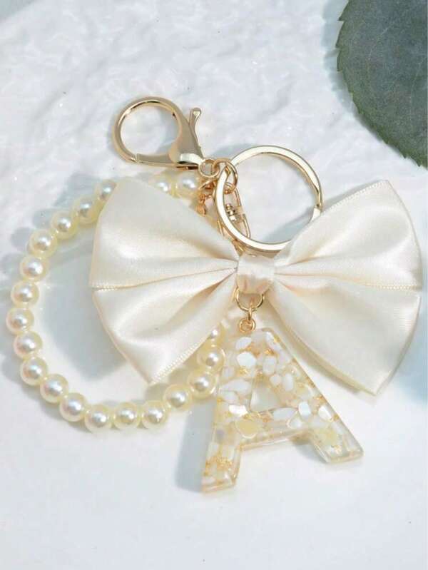 1pc White Bow Letter Keychain, Gift For Mom, Keyring For Women Bag/Backpack Decor, Pearl Pendant Halloween Accessories Teachers Day Bag Accessories Lanyards With Id Holder Car Accessories Bag Charms Christmas