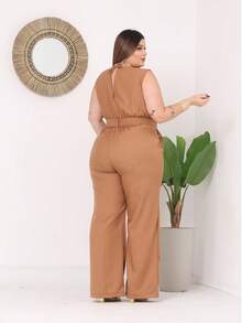 Macacão plus size feminino pantalona regata com bolso cinto decote transpassado amarração no pescoço elegante fashion moderno casual confortável versátil estiloso sofisticado prático leve fluido macio resistente chique charmoso refinado alfaiataria social clássico caimento impecável veste bem para trabalho eventos festa balada barzinho jantar coquetel rodeio igreja reuniões look dia a dia profissional inverno outono meia estação calor frio manhã tarde noite combina com salto bota tênis peça coringa atemporal custo benefício lançamento 2025 roupa feminina grande tamanho moda plus size mulher empoderada confiante linda fashionista charmosa despojada descolada para diversas ocasiões estilo confortável liberdade de movimento qualidade premium tecido leve uso diário favorita do guarda-roupa preparada com capricho essencial usar sem medo peça curinga que combina com tudo look completo elegante Natal Ano Novo Réveillon