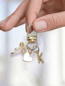 个性化心形吊坠,配有3D蝴蝶结、A-Z字母和礼品留言,心形钥匙扣,定制包包吊坠,包包挂钩,独特手机配件吊坠,包包装饰,简约蝴蝶结镶嵌钻石设计,适合女士钱包和手机配件,包包链吊坠 - 彩色 - 查看 10