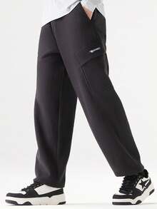 CAMEL CROWN 男士户外休闲工装风抓绒软壳裤，加厚保暖，适合春秋季穿着 - 幻影黑 - 查看 1