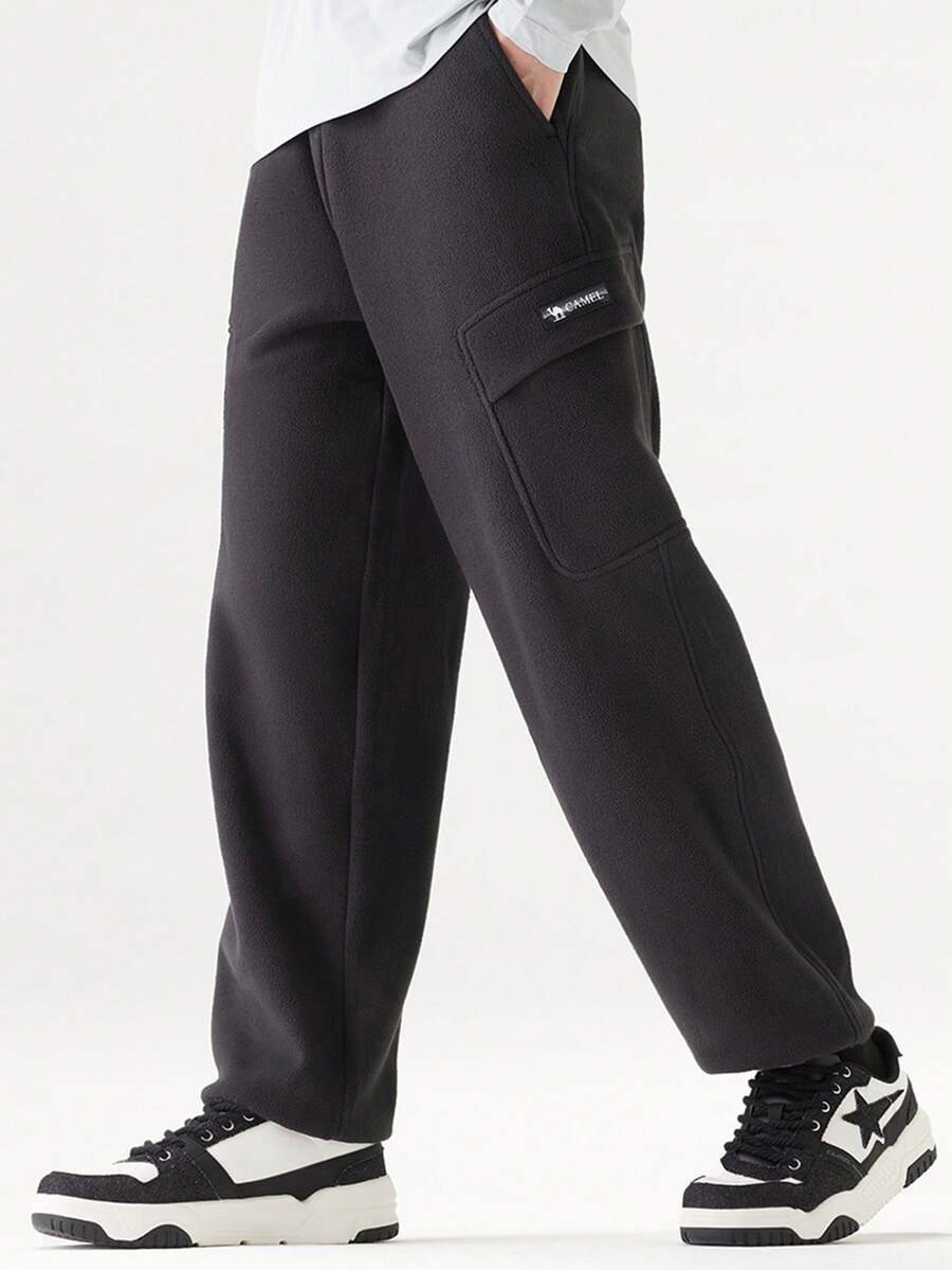 CAMEL CROWN 男士户外休闲工装风抓绒软壳裤，加厚保暖，适合春秋季穿着 - 幻影黑 - 查看 1