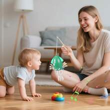 لعبة أخطبوط بمستشعر حركة، تتجنب العوائق تلقائيًا، تزحف وترقص، مع أضواء وموسيقى، تحتاج إلى 3 بطاريات AAA (غير مشمولة)