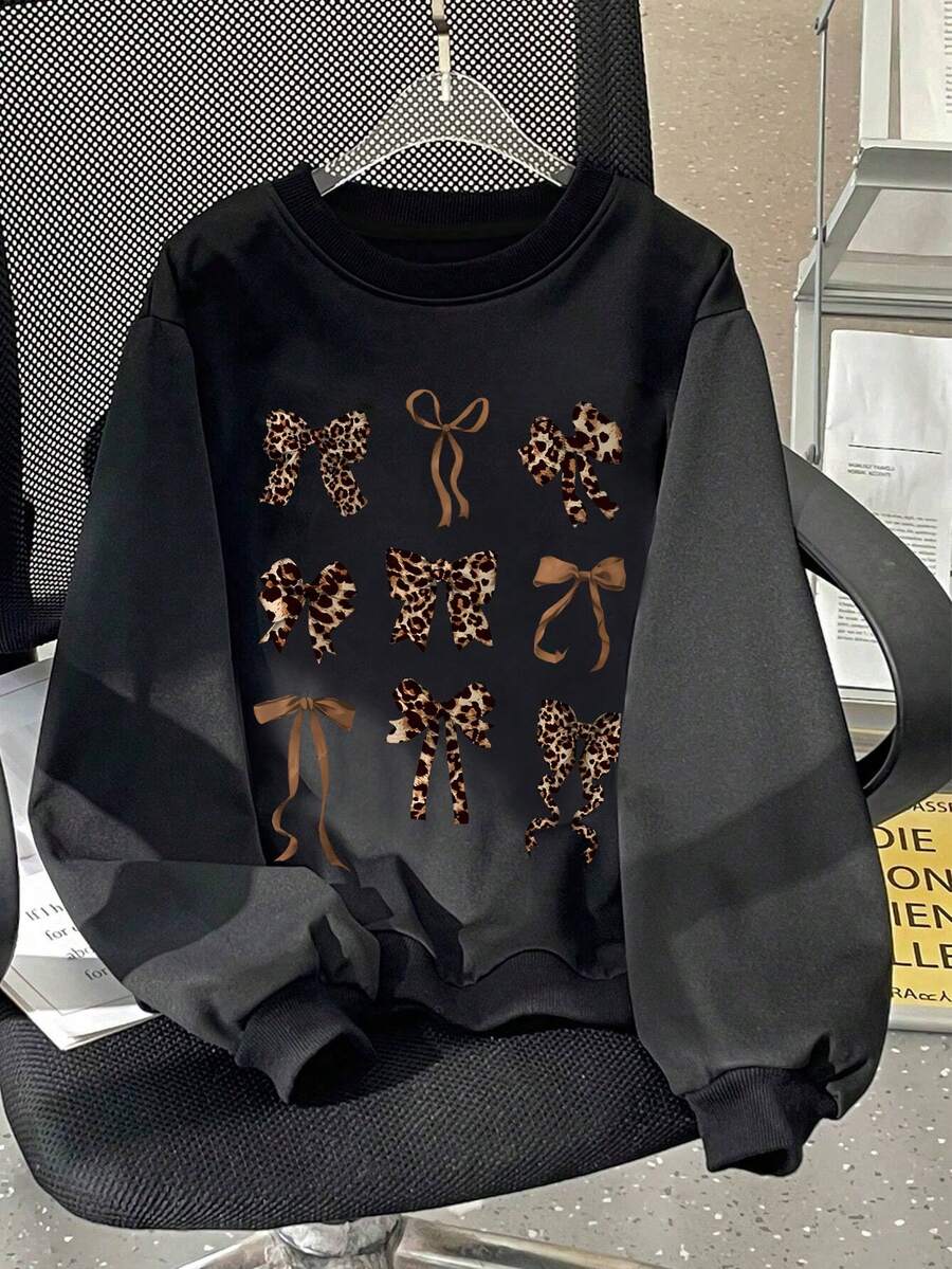 女童休閒印花圓領運動衫,長袖豹紋蝴蝶結圖案上衣,休閒舒適,適合秋冬穿著 - 黑色 - 查看 1
