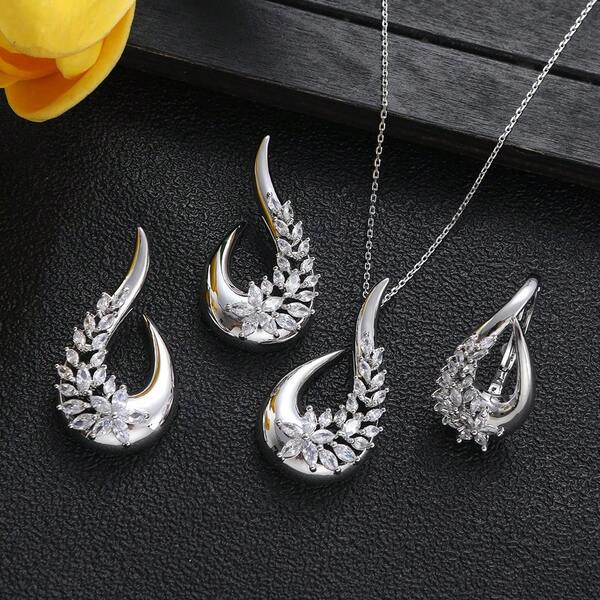 1 Set Classico ed Elegante Gioielli di Lusso Asimmetrici in Zirconia, Collana, Orecchini e Anello