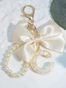 1 buc breloc cu literă cu fundă albă, cadou pentru mama, breloc pentru femei, decor pentru geantă/rucsac, pandantiv cu perle, accesorii de Halloween, Ziua Profesorilor, accesorii pentru genți, șnururi cu suport pentru legitimație, accesorii auto, brelocuri pentru genți, accesorii auto de Crăciun, idei de cadouri pentru prietena și sora