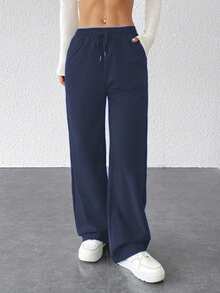 Pantalones ligeros de verano para mujer, con un diseño de corte holgado en color liso y cintura ajustable. Adecuados tanto para actividades deportivas como para el uso diario. (Nota: el primer producto utiliza un tejido más ligero y fino, tiene un precio más bajo y es de calidad estándar. Si esto le preocupa, le recomendamos que no lo compre). - Azul Marino - Ver 4