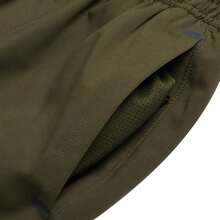 Under Armour Unaufhaltsame verjüngte Hose - Grün, gewebte gerade geschnittene Herren Outdoor Sporthose 6003861-308