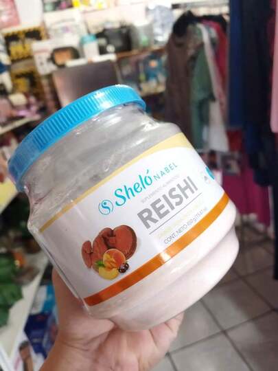 Shelo Nabel Reishi polvo para preparar bebida sabor durazno y ciruela, suplemento nutricional tradicional, antioxidantes y vitaminas, bebida saludable, fácil disolución, ideal para bienestar diario.