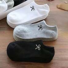 1/15 双男女款蝴蝶结运动短袜，春夏季款，白色/黑色/灰色可选。舒适透气，简约时尚的设计，适合日常休闲穿着。