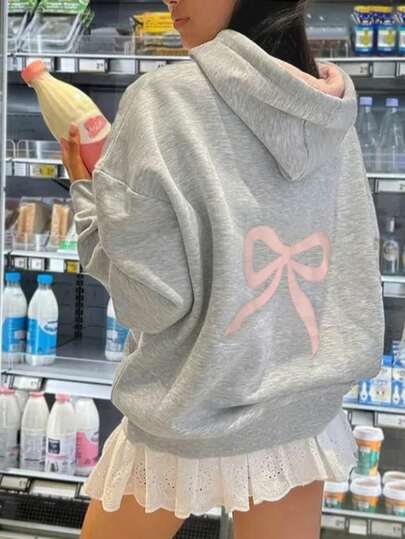 Damen lässiger, modischer Color-Block-Schleifendruck-Kapuzenpullover mit Langarm, früher Herbst