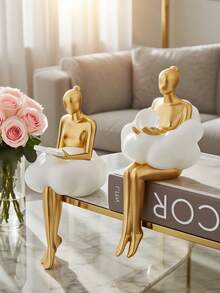Bộ tượng nàng tiên mây vàng: Tác phẩm điêu khắc bằng nhựa nghệ thuật, trang trí nhà cửa thanh lịch - Màu vàng óng ánh - Các nàng tiên ngồi trên ghế hình mây, một người cầm quả cầu pha lê, người kia đang đọc sách - Trang trí kệ sách và bàn làm việc, làm nổi bật phong cách phòng khách, phòng ngủ, văn phòng. - Nhiều màu - Xem 3