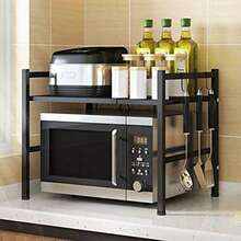 Mueble de cocina, soporte para microondas de 2 niveles, extensible en altura y anchura, con 6 ganchos, perfecto para colgar tus utensilios de cocina, color blanco/negro