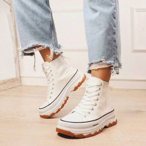 angelica Wysokie trampki z grubą podeszwą – nowoczesny, miejski styl, idealne na spacery, zakupy, imprezy czy niezobowiązujące wyjścia. Szybka wysyłka.