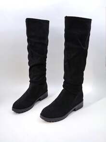 A Pair Of Fashionable Girl's Knee - High Boots With A Slouchy, Ruched Design. Ideal For Elevating Daily Looks, Adding Flair To Holiday Getaways, And Making A Statement At Parties. The Perfect Blend Of Style And Versatility For Every Occasion."Ruched Girl's Tall Suede Boots""Chunky Heel Knee - High Suede Boots""Casual Party Knee - High Boots""Versatile Slouchy Knee - High Boots"