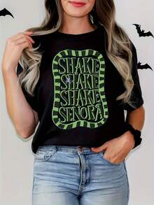 Camiseta de Halloween para Mujer "Shake Shake Shake" - Camiseta Beige con Letras Verdes en Negrita, Atuendo para Fiestas y Otoño Casual - Ropa Suave, Transpirable y Lavable a Máquina, Diseño Divertido, Ajuste Cómodo, Moda Festiva, Ideal para Compras - Oscuro - Ver 1