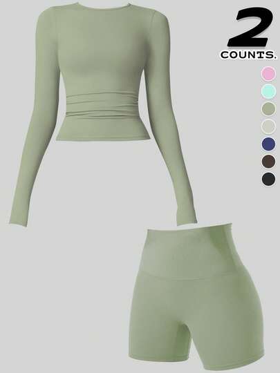 A Set Of Yoga Set For Hip Lift And Tummy Tuck, The Combination Of Comfortable Upper Sleeves And Hip Lift Shorts Is Suitable For Yoga Practice, Running, And Women's Gym Workouts For Festivals Can Be Worn