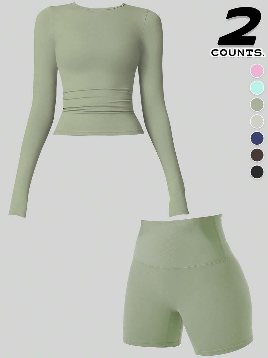 A Set Of Yoga Set For Hip Lift And Tummy Tuck, The Combination Of Comfortable Upper Sleeves And Hip Lift Shorts Is Suitable For Yoga Practice, Running, And Women's Gym Workouts For Festivals Can Be Worn