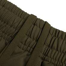 Under Armour Unaufhaltsame verjüngte Hose - Grün, gewebte gerade geschnittene Herren Outdoor Sporthose 6003861-308