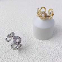 Anello aperto regolabile, anello da donna elegante e lussuoso. Incastonato con zirconi scintillanti, in metallo di ottone ipoallergenico, adatto per uso quotidiano - anello aperto - Visualizzare 2