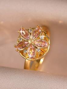 1 pieza Anillo elegante de cinco hojas de trébol rosa con baño de oro, flor de durazno giratoria, para cumpleaños, citas, compromiso para mujeres, anillo individual de cobre con circonita cúbica como regalo