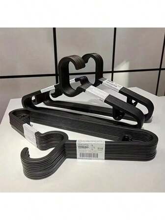 20/10 piezas Perchas de plástico antideslizantes y ultradelgadas, Estantes versátiles para secar ropa para tiendas de ropa, Diseño elegante en negro/blanco, Maximiza el espacio del armario, Perchas con muescas resistentes para un almacenamiento , Capacidad de carga duradera, Ideal para cuartos de lavandería, Perfecto para abrigos, trajes, camisas y vestidos de adultos, Esencial para la organización de vacaciones, Regalo perfecto para Navidad, Acción de Gracias, Año Nuevo y Día de San Valentín, Mejora tu armario con elegancia funcional, Optimiza tu espacio con estas perchas imprescindibles para cada temporada.