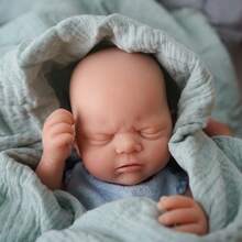 This 12-Inch Reborn Doll Is A Cute Baby Boy Wearing A Blue Fish Pattern Outfit, With Eyes Closed, Can Be Bathed, Soft And Realistic Touch, Made Of Silicone Material, An Ideal Children's Birthday Gift, Collectible Toy, And Halloween/Christmas Gift. - Blue - View 4