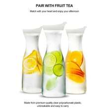 قطعة واحدة إبريق مقاوم للتسرب بشكل خصر مع غطاء قابل للقلب، علبة بلاستيكية شفافة، مصنوع من مادة البولي كربونات، ماكينة مشروبات صيفية، يمكن أن تحتوي على عصير وشاي وكوكتيلات، مواصفات متعددة تتراوح بين 20/37/54 أونصة للاختيار من بينها، مناسب لحفلات العطلات والأعراس والاستخدام العائلي، وأيضًا ضروري للإجازات الشاطئية