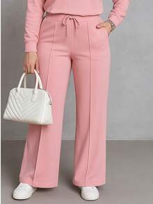 Traje 2 piezas casual de otoño que incluye blusa corta holgada y pantalones pierna ancha tipo pata elefante amplios y cordón en la cintura tela sin transparencias - Rosa - Ver 3