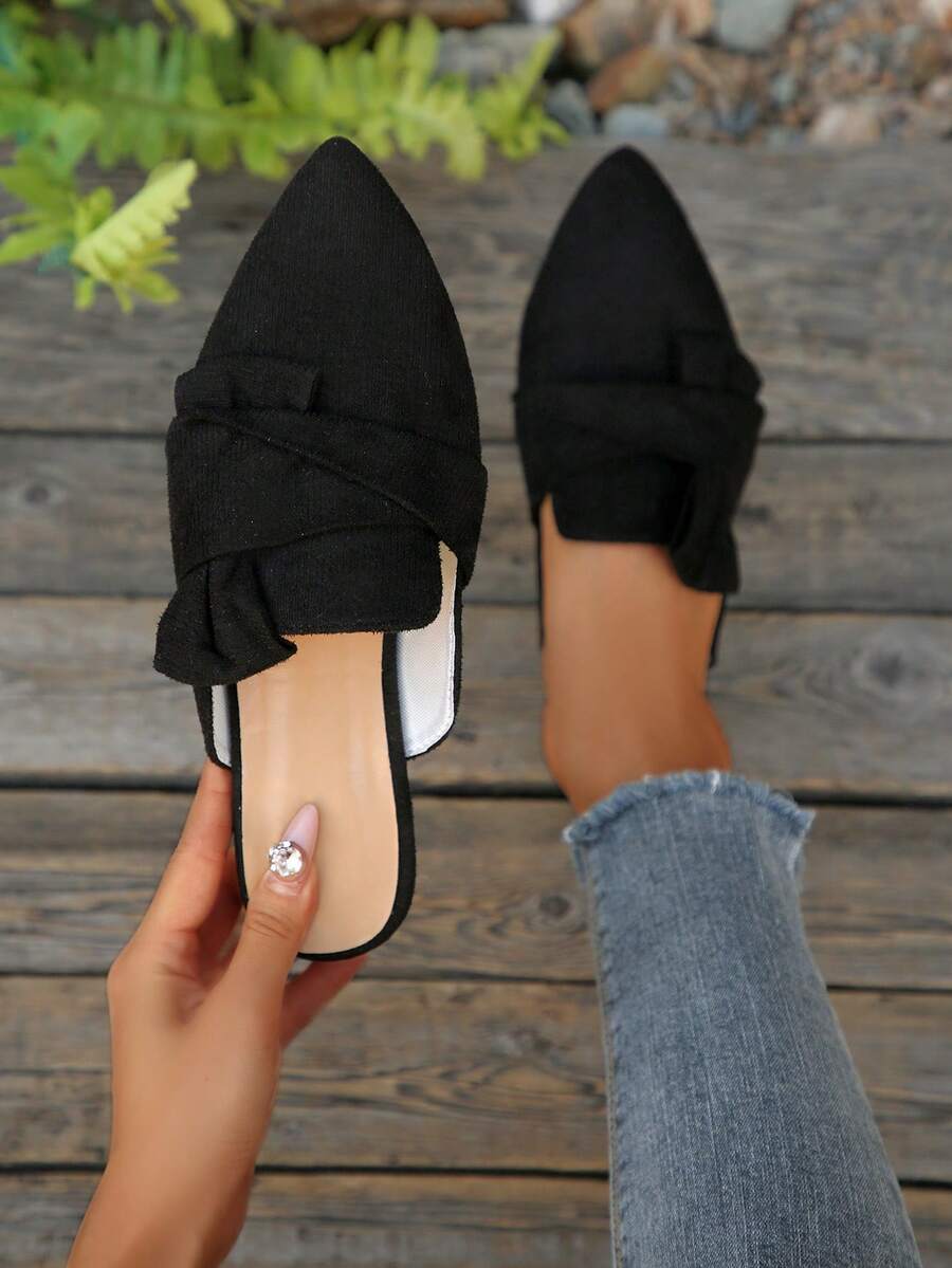 Zapatos de mula negros, mocasines sin talón de punta afilada para mujer, de tela, con decoración de lazo, versátiles y elegantes mulas planas para todas las estaciones - Negro - Ver 1