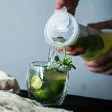 قطعة واحدة إبريق مقاوم للتسرب بشكل خصر مع غطاء قابل للقلب، علبة بلاستيكية شفافة، مصنوع من مادة البولي كربونات، ماكينة مشروبات صيفية، يمكن أن تحتوي على عصير وشاي وكوكتيلات، مواصفات متعددة تتراوح بين 20/37/54 أونصة للاختيار من بينها، مناسب لحفلات العطلات والأعراس والاستخدام العائلي، وأيضًا ضروري للإجازات الشاطئية