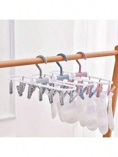 12개 클립이 있는 빨래 건조대: 접이식, 다기능 양말 건조기 및 빨랫줄용 회전식 윈드삭 걸이, 양말, 아기 수건, 아기 옷에 이상적인 걸이, 작은 방을 위한 공간 절약형 세탁 정리함, 빠른 접근 건조 솔루션, 튼튼하고 가벼운 프레임, 섬세한 의류 및 일상복을 위한 다용도 실내외 세탁 액세서리, 완벽한 가정 세탁 도우미, 빠른 건조를 위한 효율적인 공기 흐름 디자인, 일상적인 세탁 요구를 위한 실용적인 건조대, 바쁜 가정을 위한 세련되고 컴팩트하며 보관이 쉬운 건조대