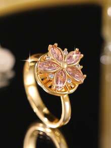 1 pieza Anillo elegante de cinco hojas de trébol rosa con baño de oro, flor de durazno giratoria, para cumpleaños, citas, compromiso para mujeres, anillo individual de cobre con circonita cúbica como regalo