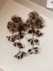 Pendientes con borlas con estampado de leopardo y flores de tela exagerada, pendientes personalizados de moda con un ambiente de lujo de alta gama